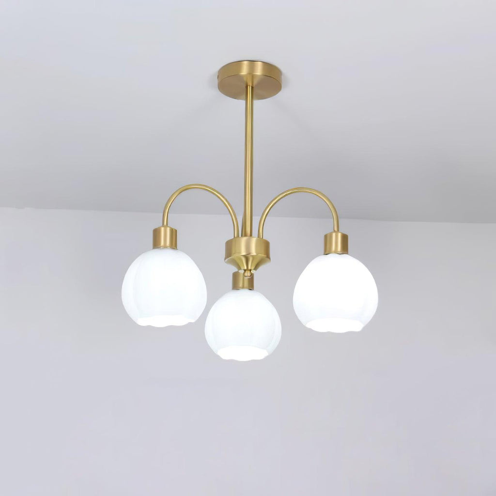 Lustre de vidro em formato de abóbora dourada