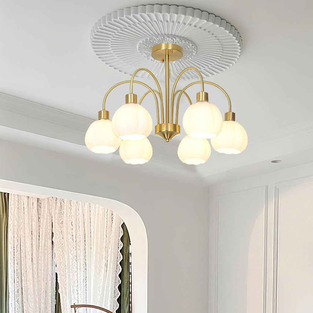 Lustre de vidro em formato de abóbora dourada