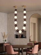 Lustre de colar de contas de nogueira