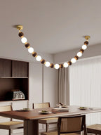 Lustre de colar de contas de nogueira