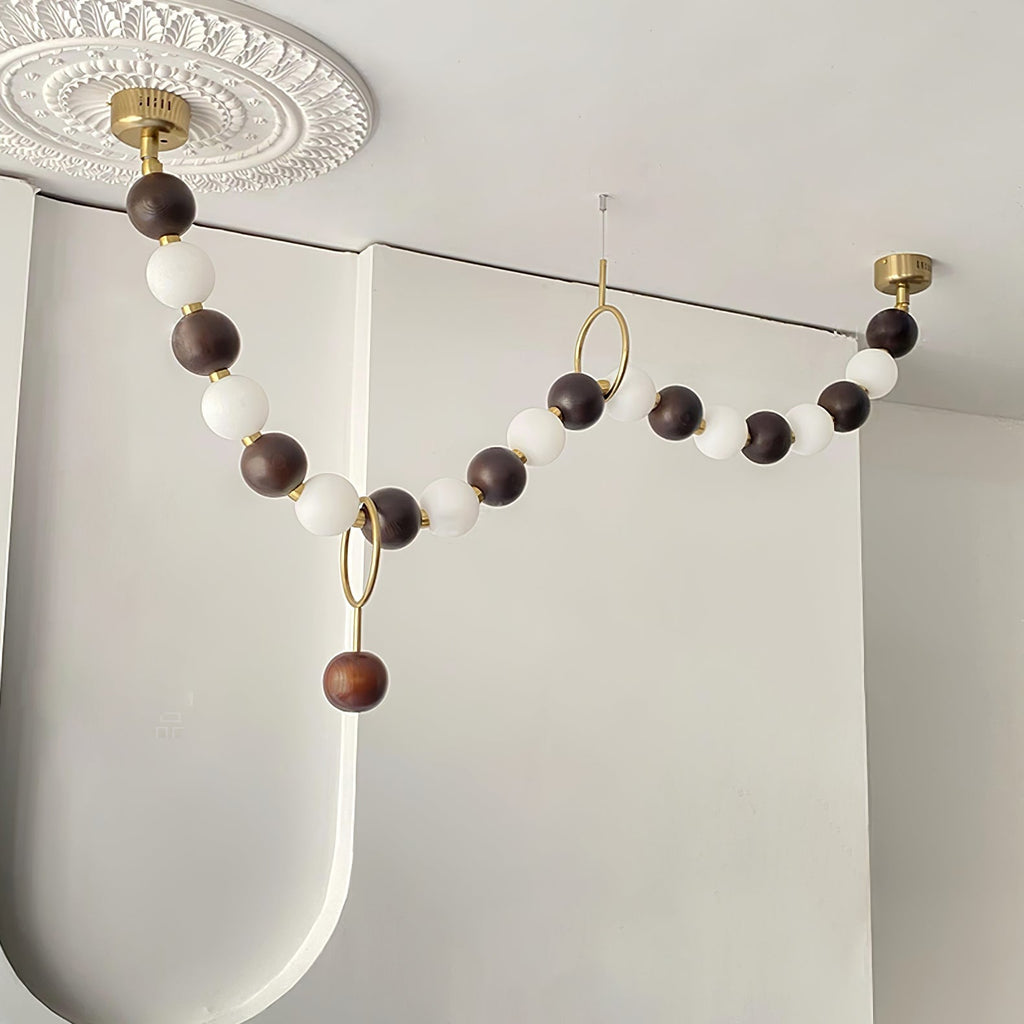 Lustre de colar de contas de nogueira