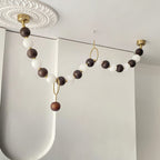 Lustre de colar de contas de nogueira