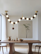 Lustre de colar de contas de nogueira