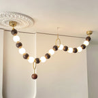 Lustre de colar de contas de nogueira